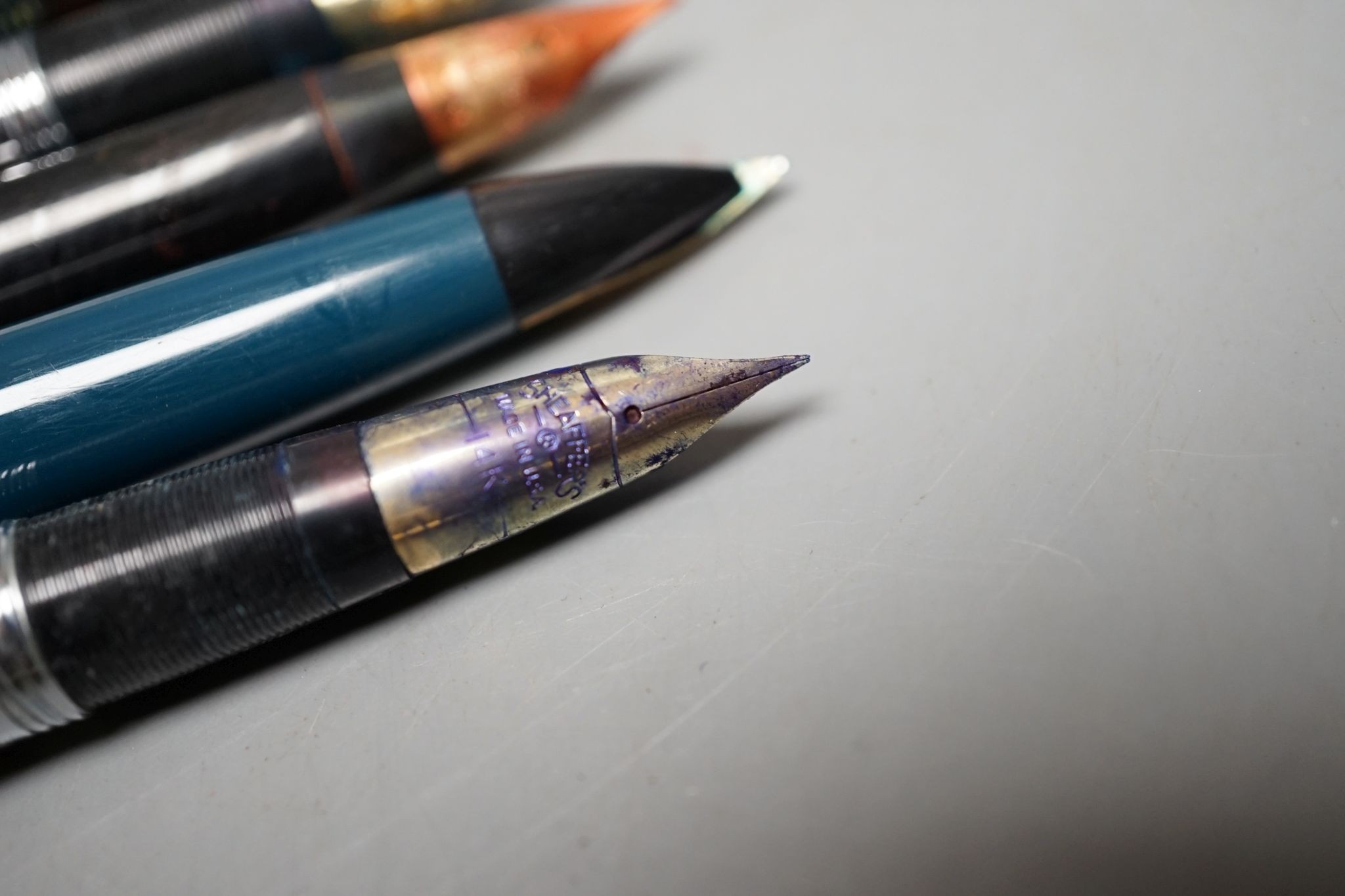 Seven assorted pens including fountain pen with 18ct gold nib.